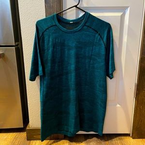 Vent tech. Aqua and black short sleeve shirt